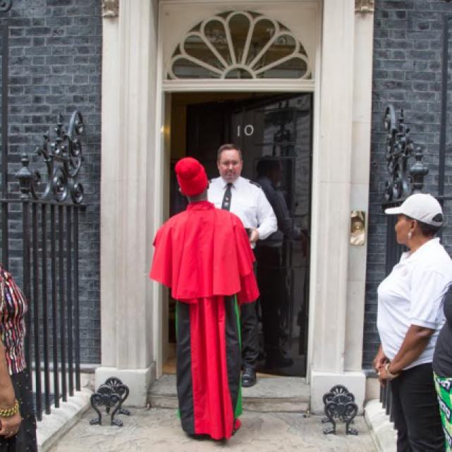 London: A delegation hands in 'Stop The Maangamizi' Petition at Prime Minister's Office, 10 Downing Street on 1st August to counter Afrikan Holocaust (Maangamizi) denial and demand holistic reparatory justice for the Afrikan Holocaust.